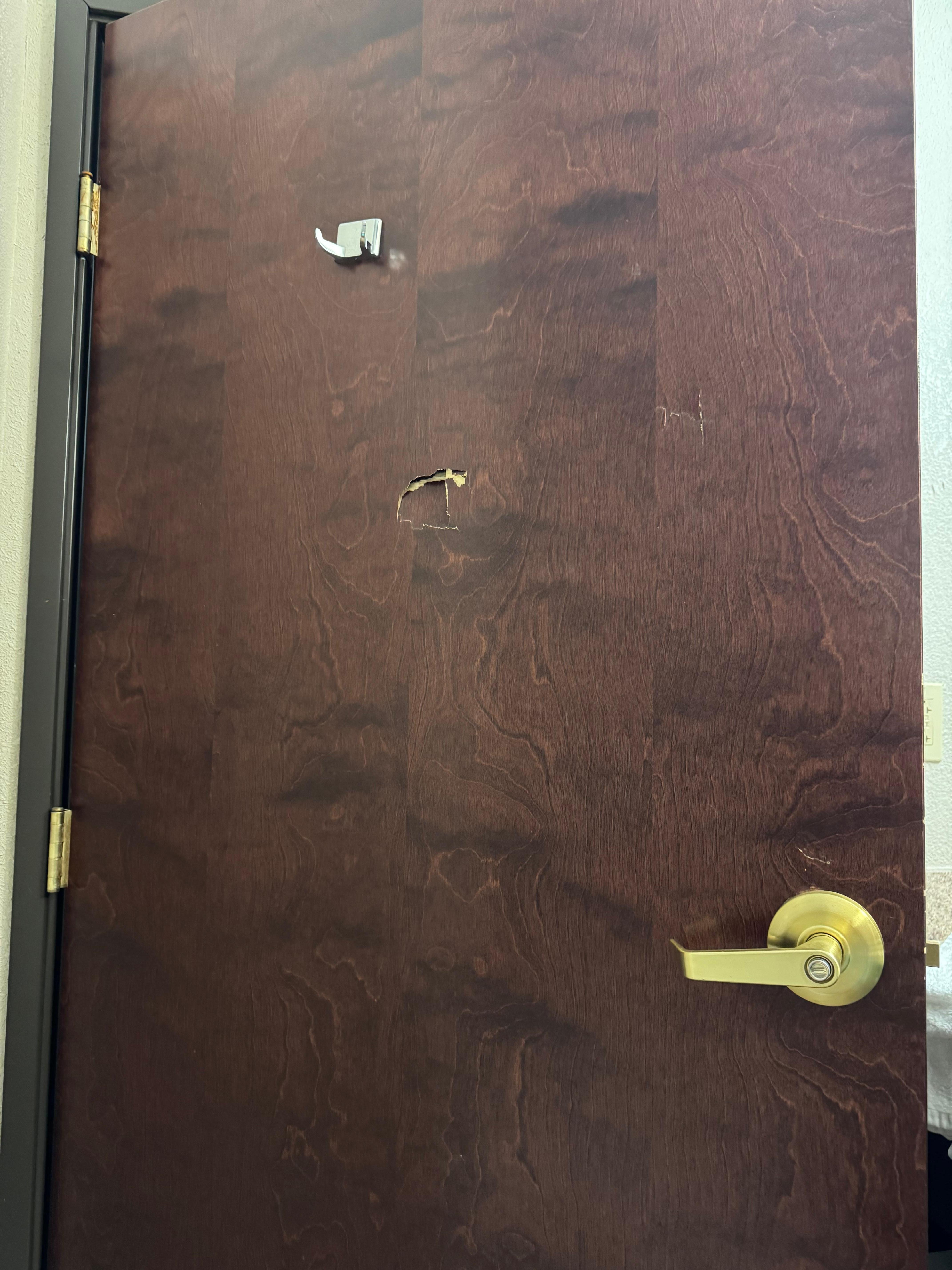 Behind the bathroom door room 202