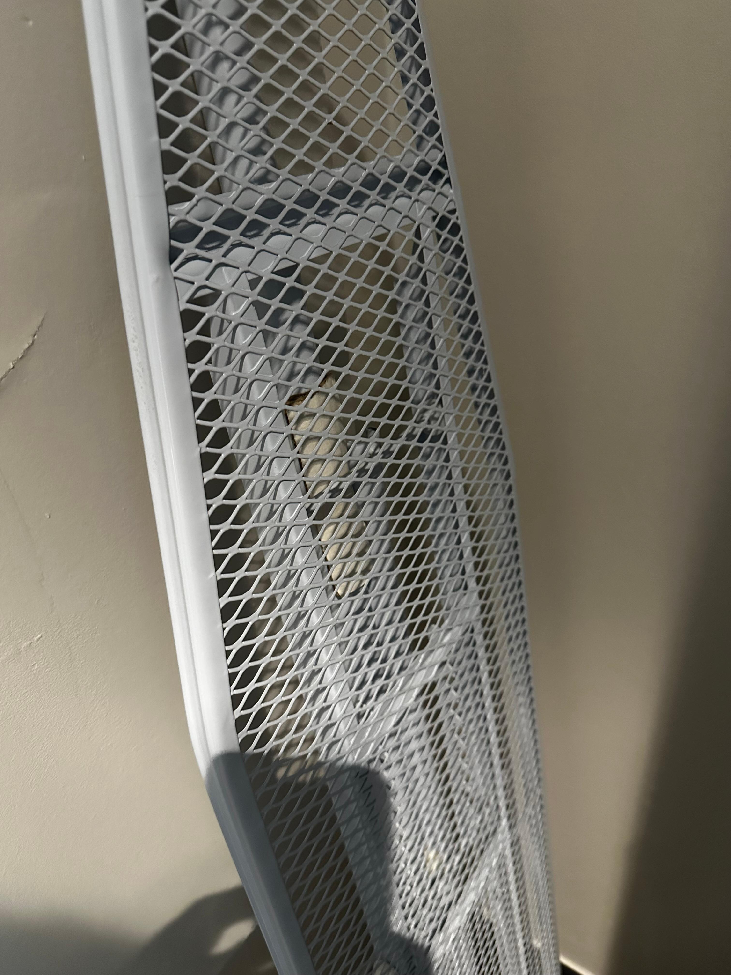 Ironing board had no cover.