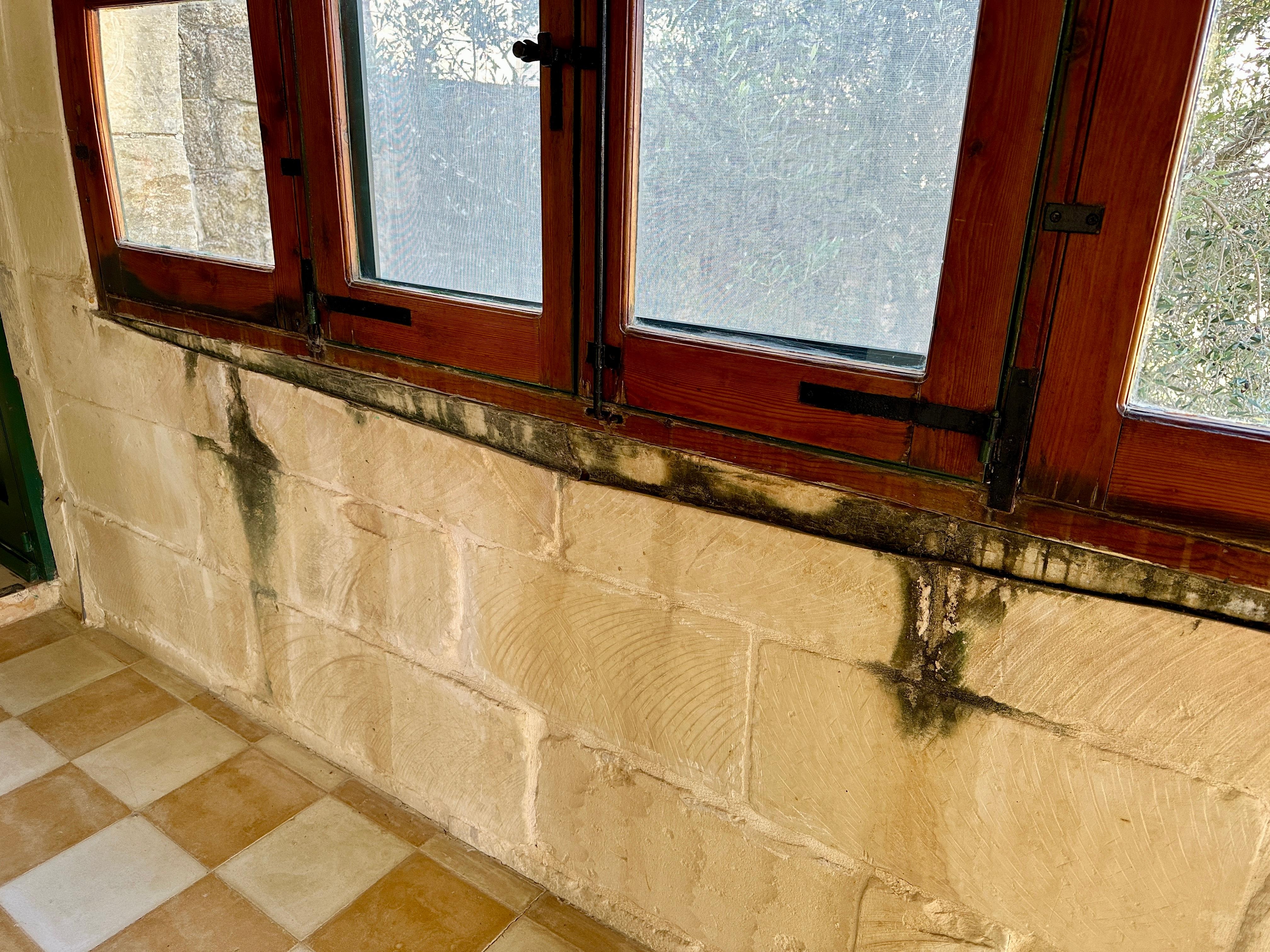 Damp walls outside bedrooms