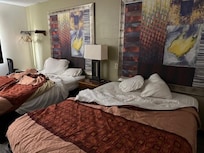 Gray, dingy, see through Sheets. Soggy pillows