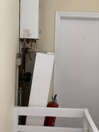 Gas water heater falling apart - dangerous??