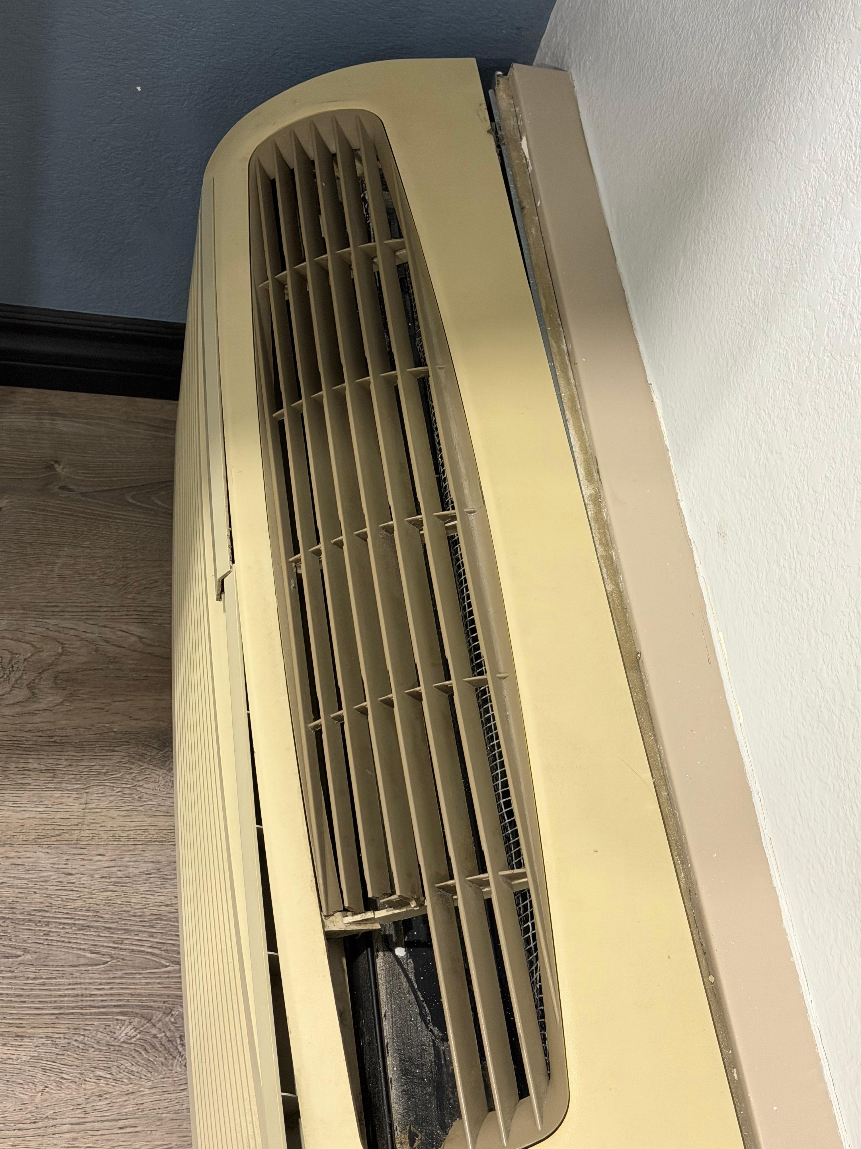 Broken AC with dust collection all over