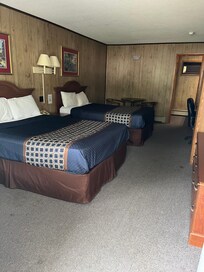 A portion of the stained and gross carpet is visible in this picture.
