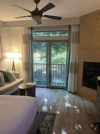 Our room with king size bed, sofa, fireplace, TV, small fridge and Starbucks coffee!