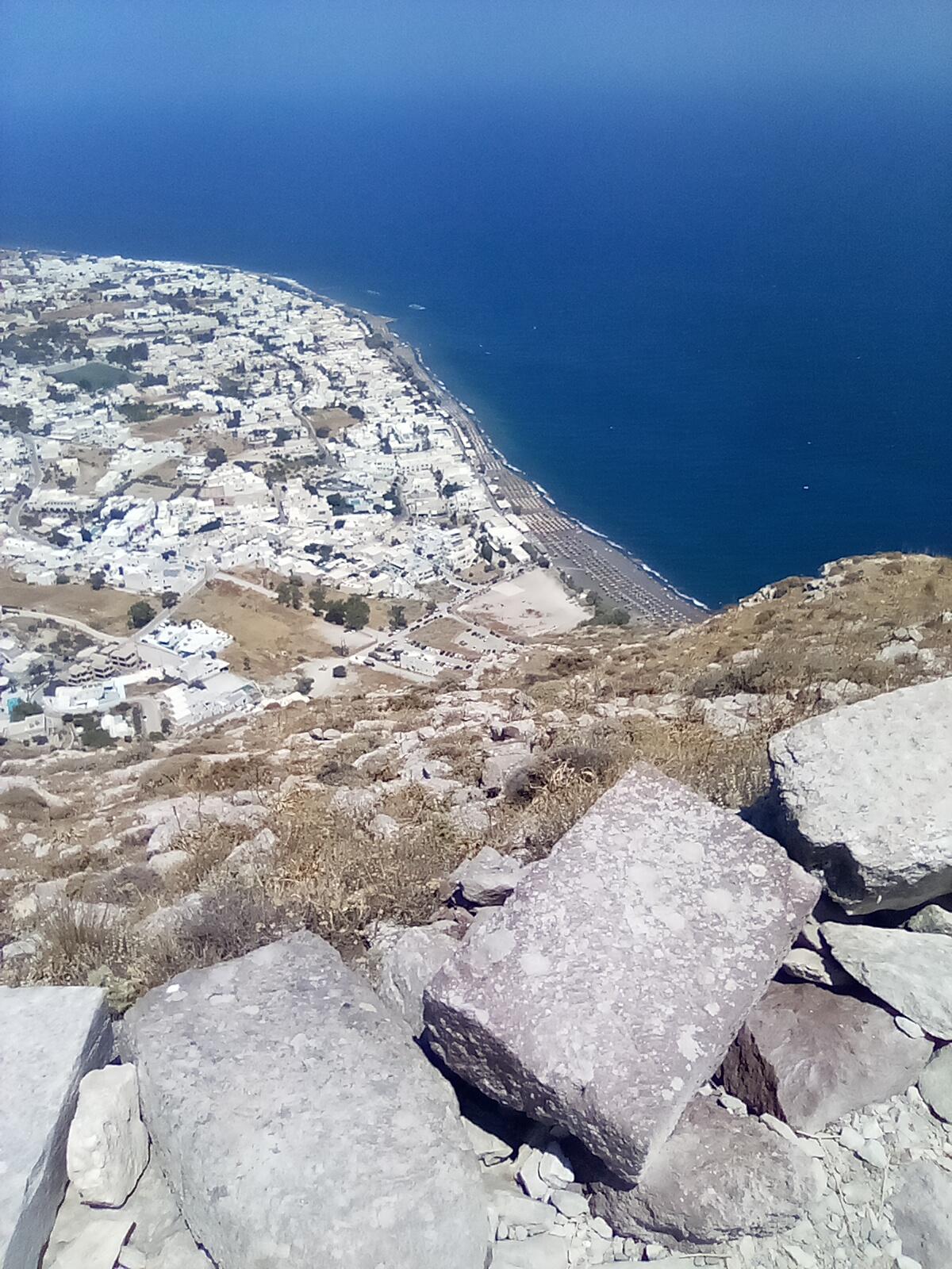 The view of Kamari resort on the other side of Mountain Mesa Vouno from Perissa resort.