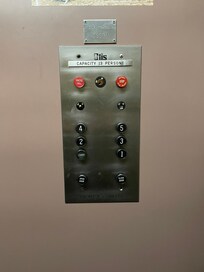 Sign saying 13 people in the elevator!!!