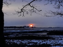 This was the setting of a full moon from the sitting room it was amazing.