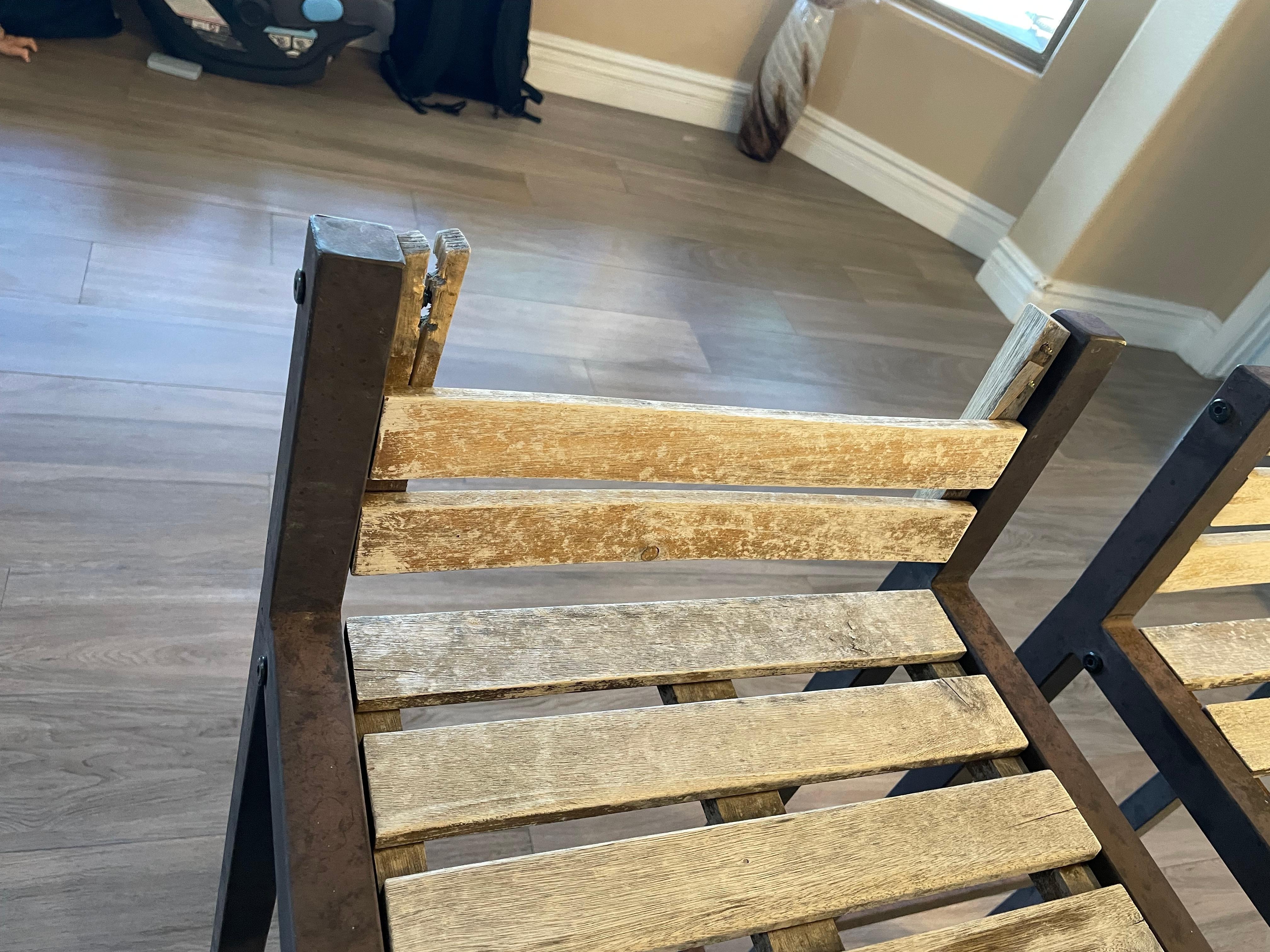 Broken furniture with sharp screw poking out.