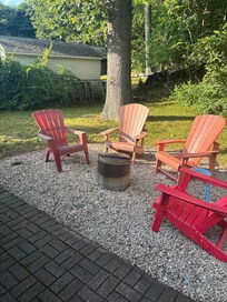 Lovely fire pit and backyard with lots of privacy!