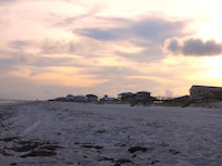 Beautiful sunset, clean beach, soft breezes..