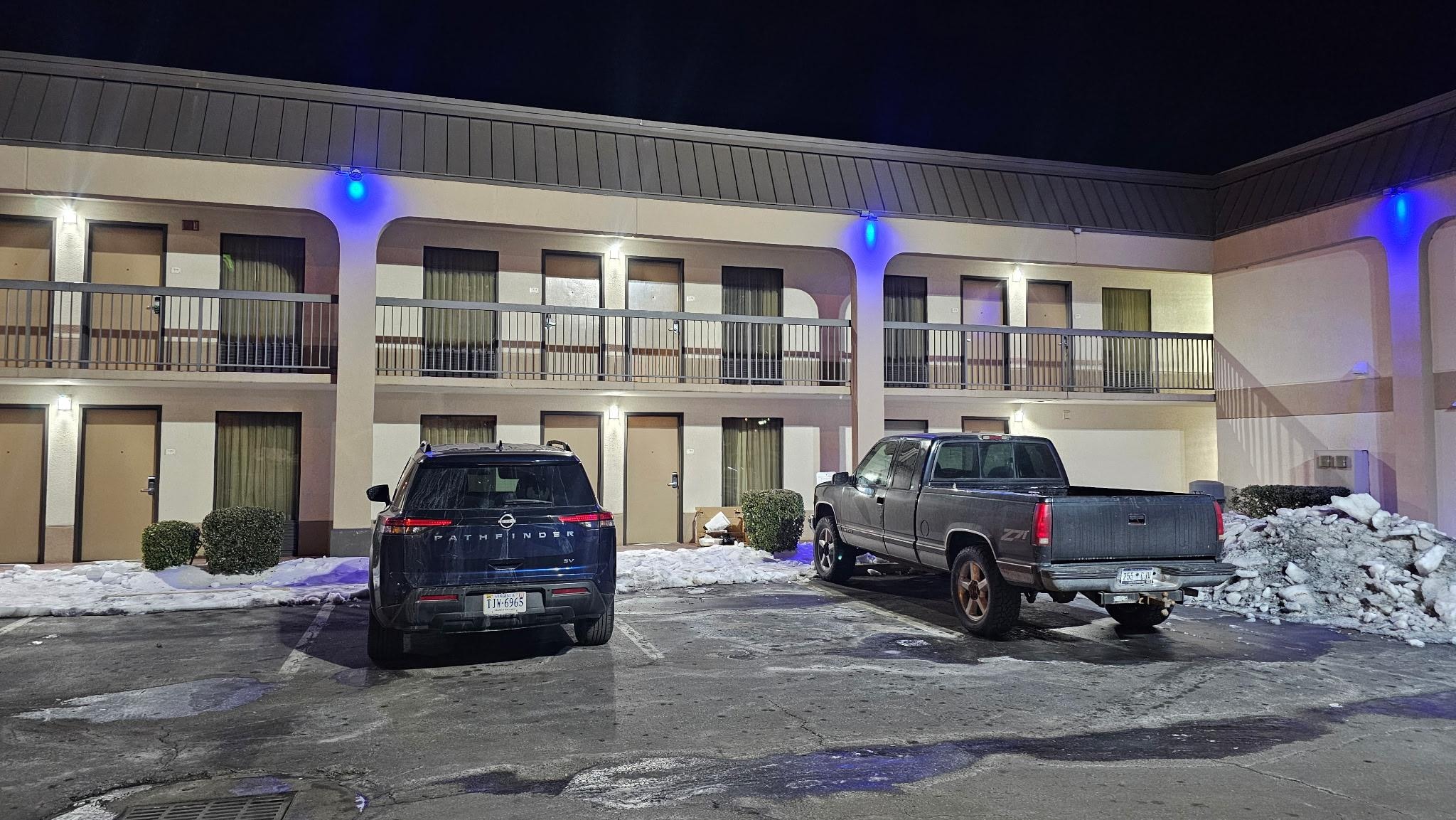 Loud, outside property door.