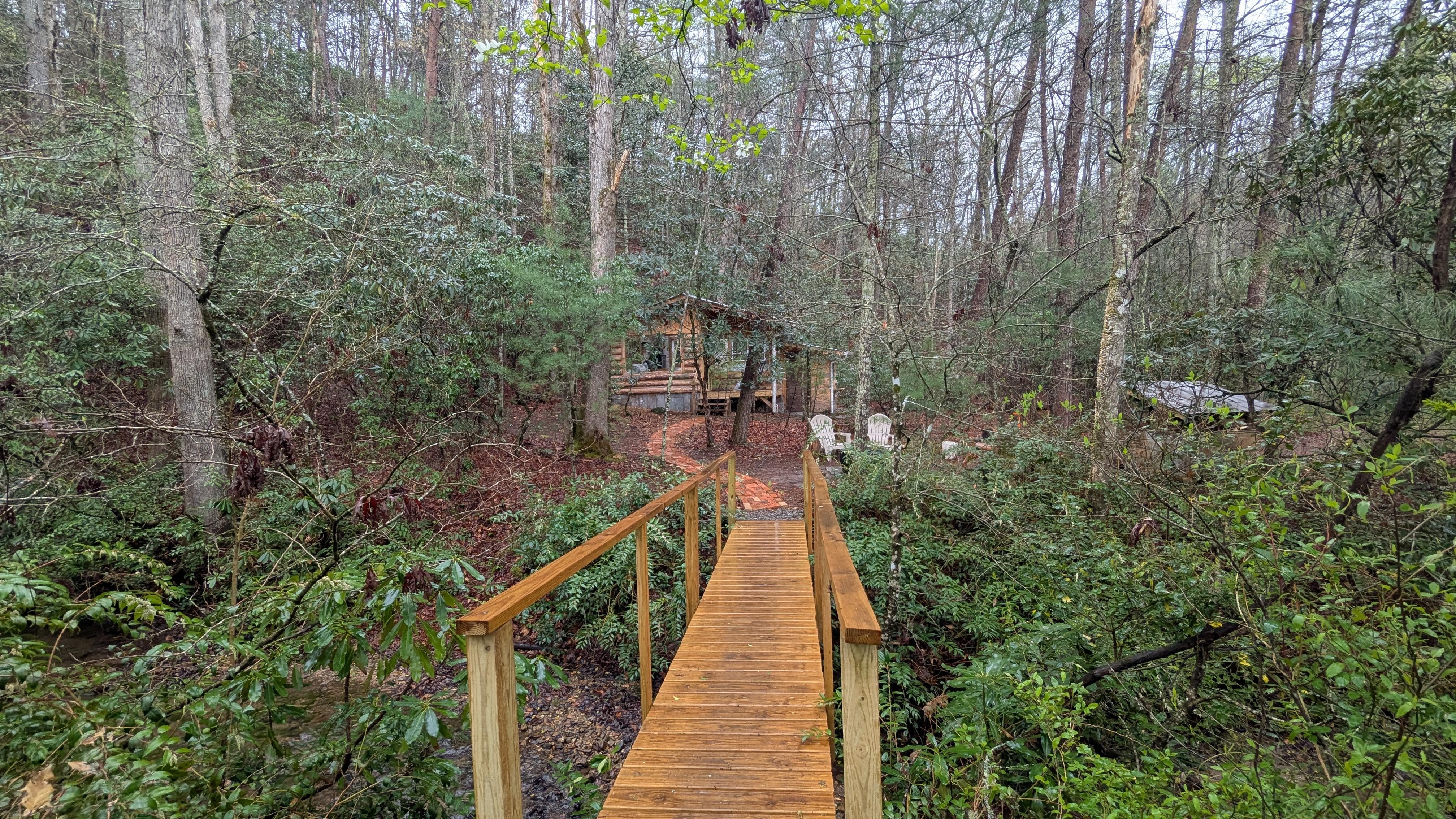 The host will provide clear directions on how to get to the VRBO. There is a small parking area on one side of this little bridge and then you walk over to the cabin.