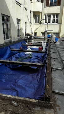 Out the only opening window…restaurant exhaust in your lungs