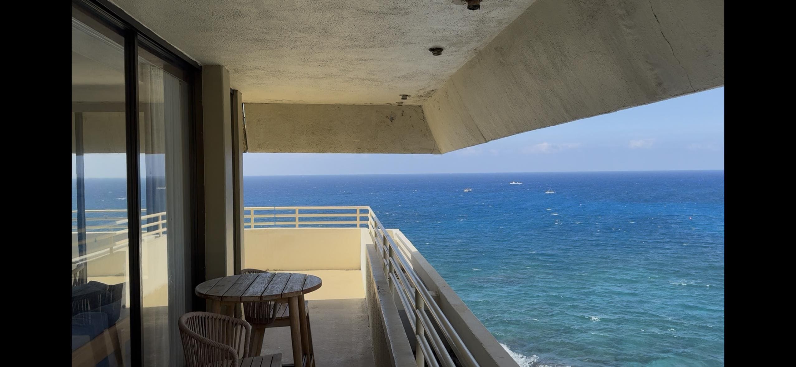 Our room was next to a true oceanfront room, which remained empty throughout our stay. Despite this, it was never offered to us, and we could only catch a glimpse of the ocean by peeking through their balcony.