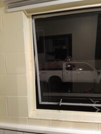 Dirty water running down window