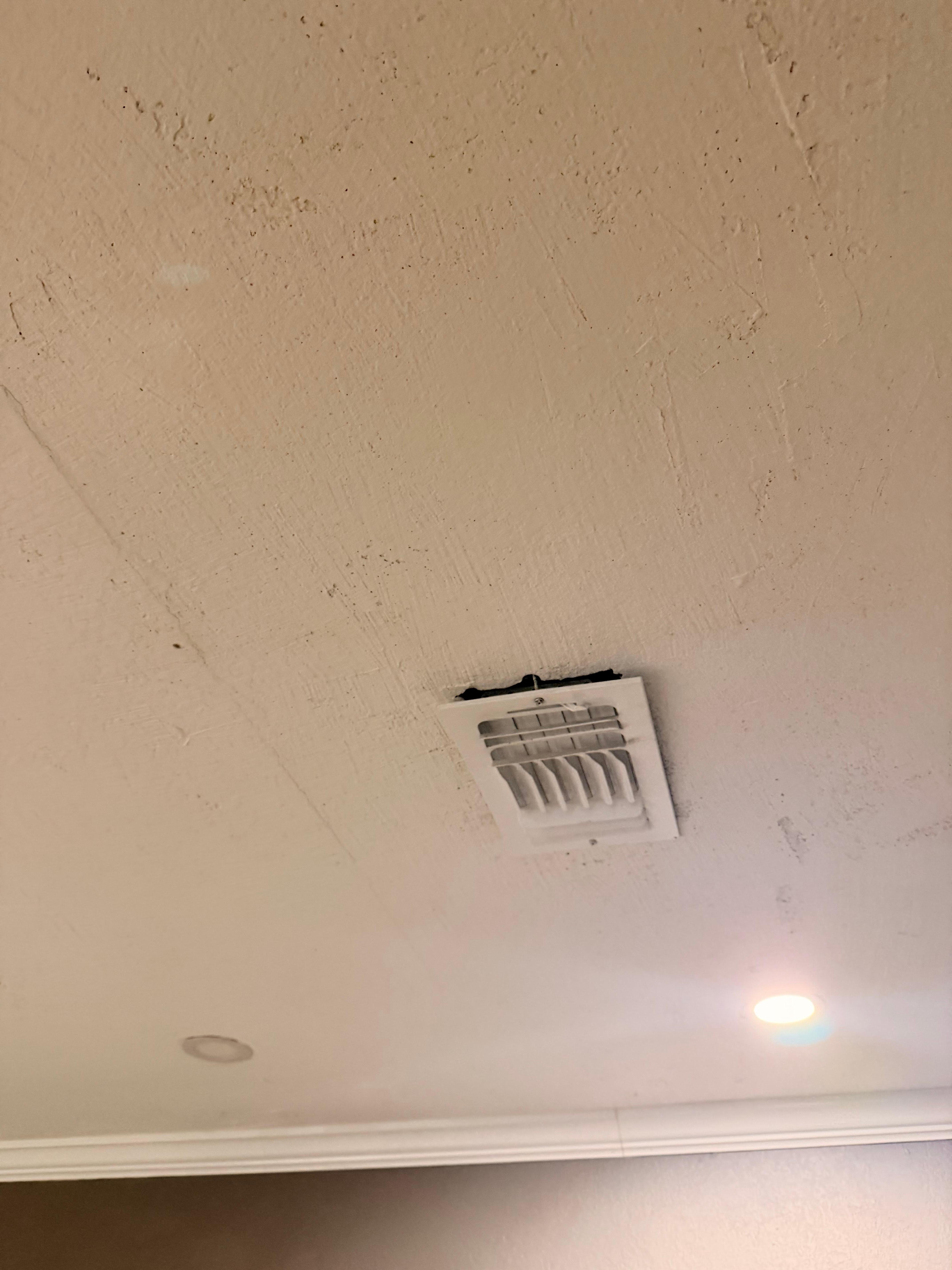 Vent literally hanging out of the ceiling 