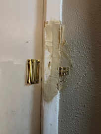 Busted door chain for the door outside - parking lot flooded with crack heads at night.