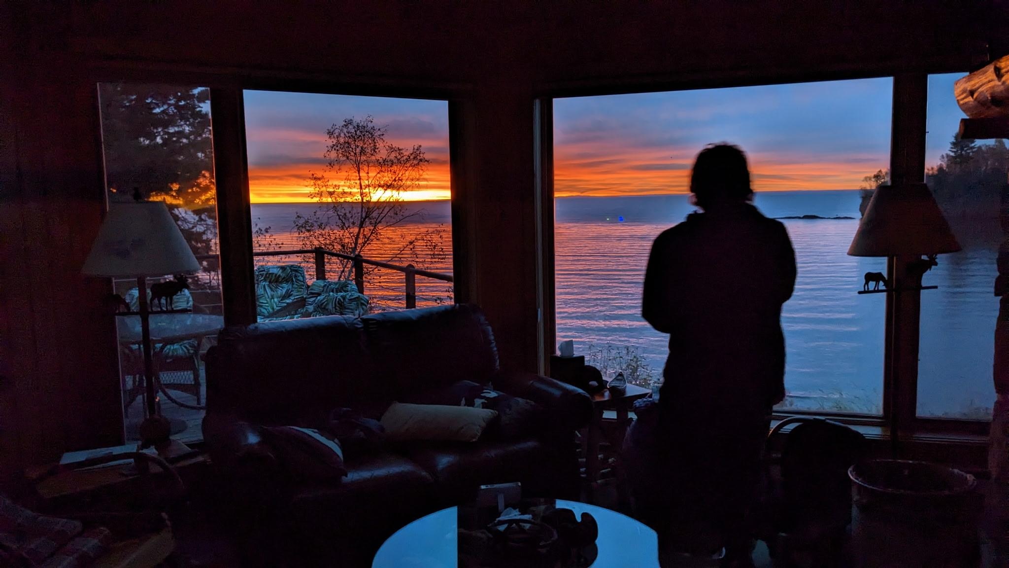 Holding our baby catching the sunrise