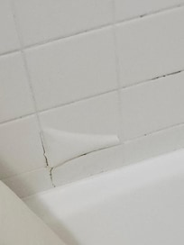 Tile peeling in tub