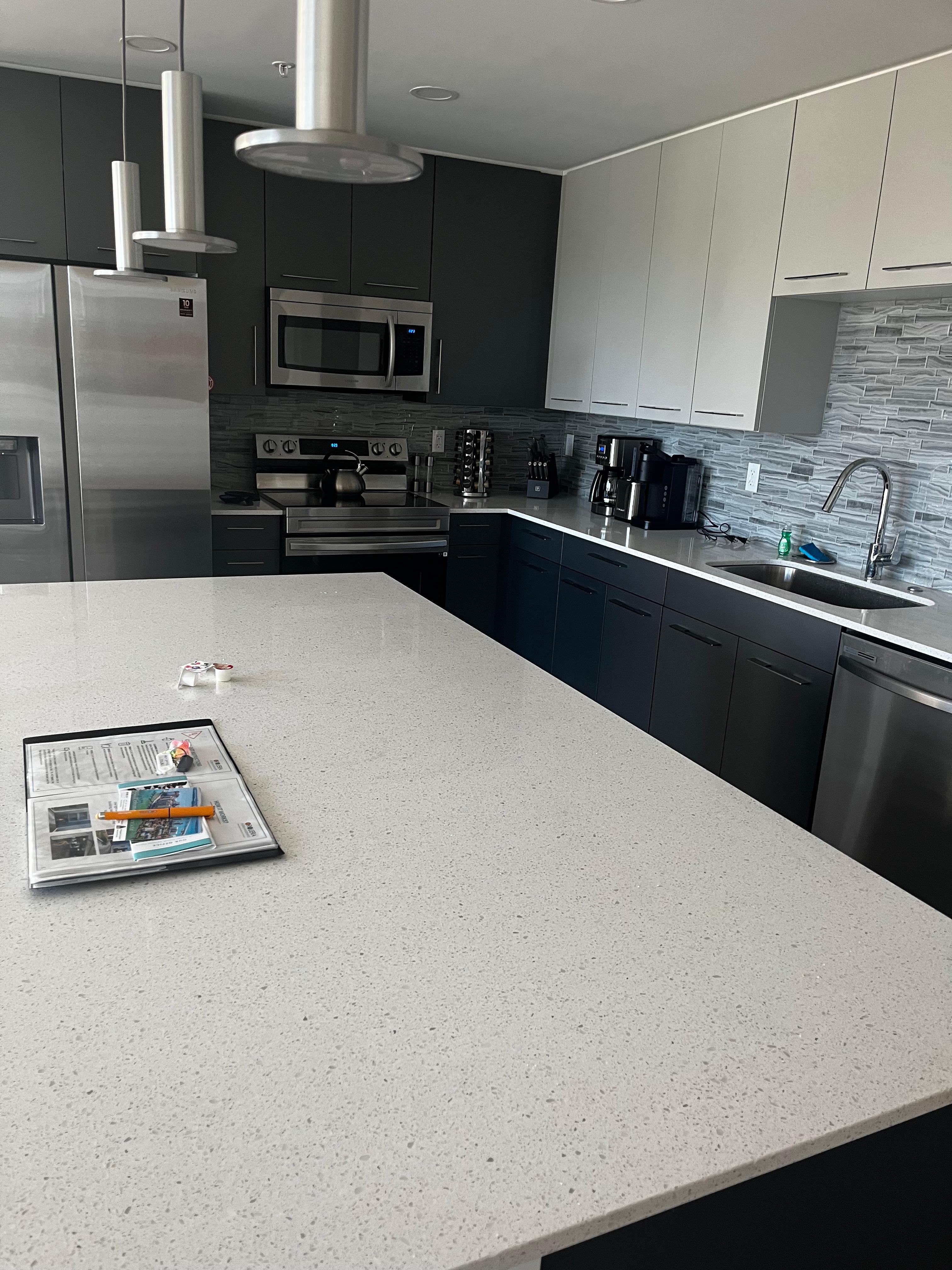 Great kitchen with modern appliances and cookware.
