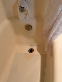 Bathtub was gross and the water temperature shifted wildly from scorching hot to cold.