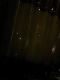 Holes in curtains look like cigarette burns