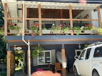 One of the bedroom windows is in the carport.