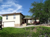 Two car garage a plus to get vehicles out of the heat and the best entrance.