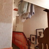 Hallway drying laundry
