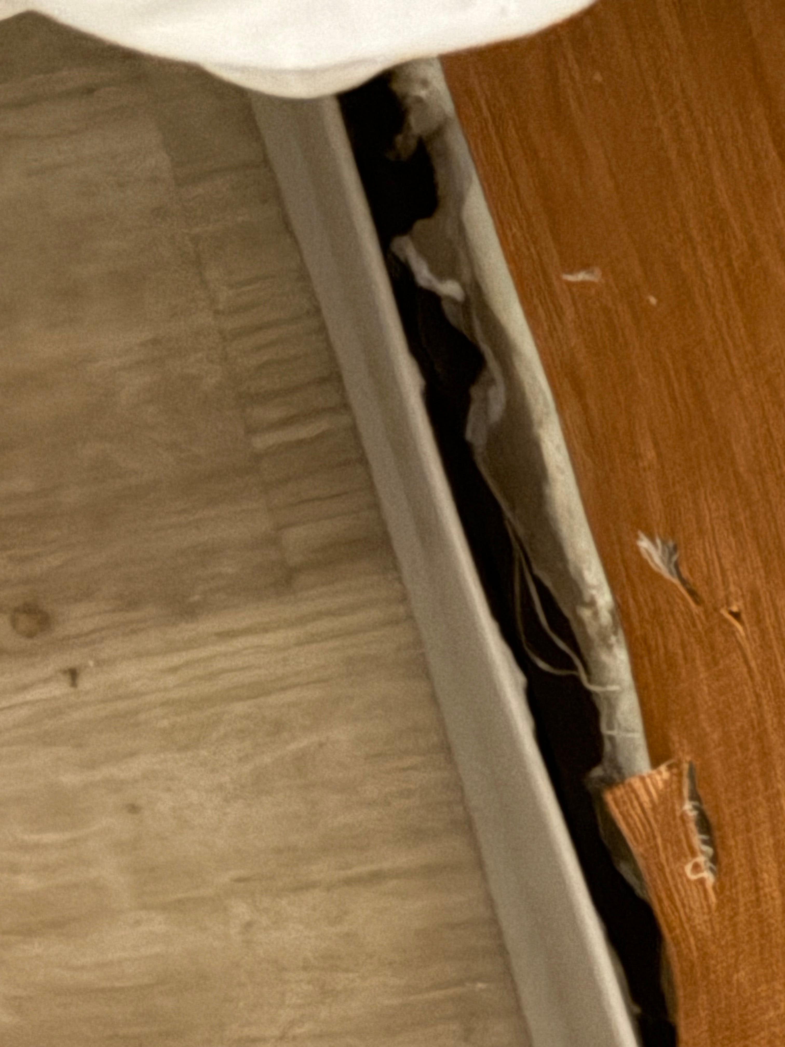 Floor and wall separation, this picture does not do this hole justice 