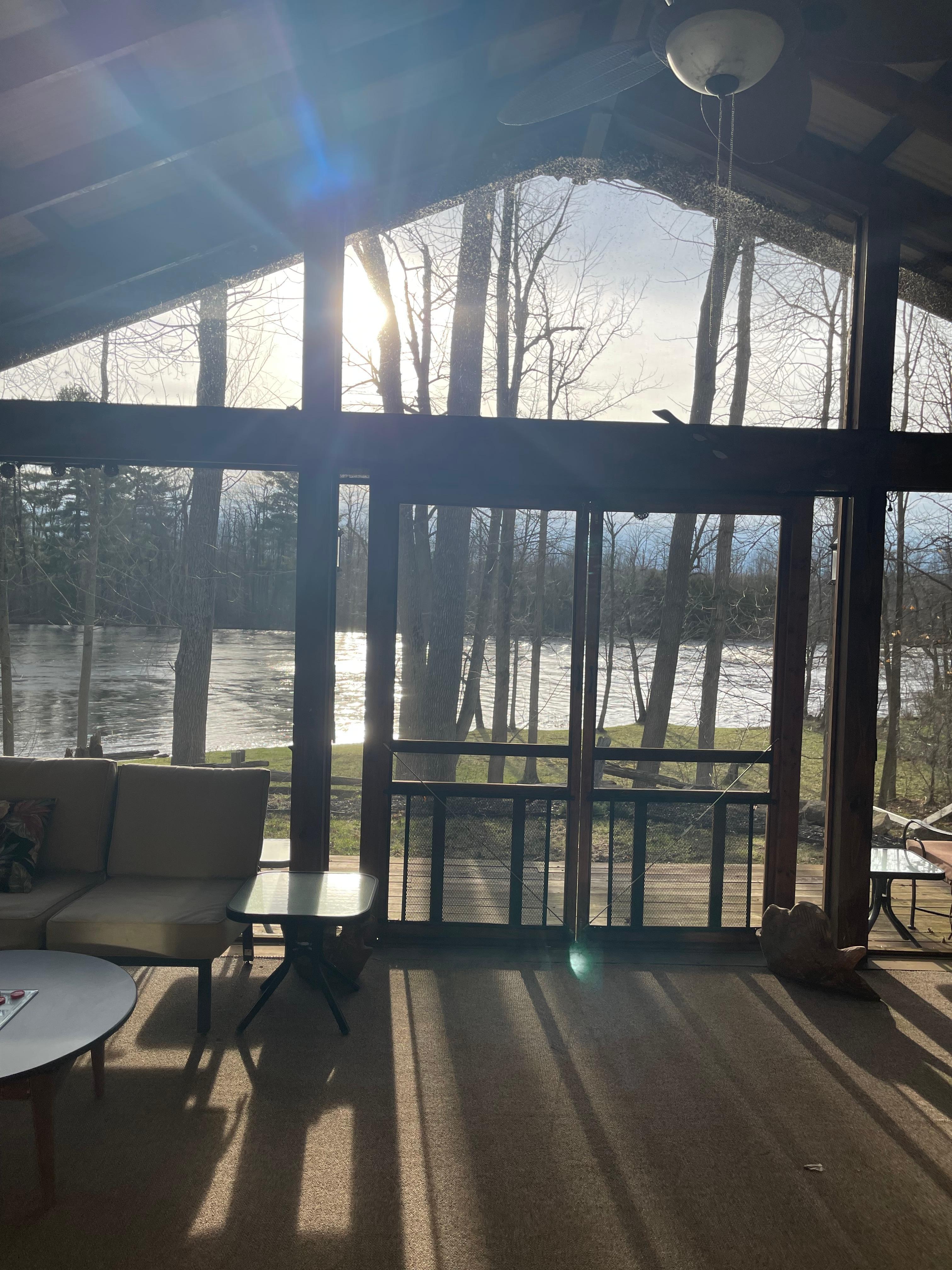 Screened in porch over looking creek 