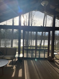 Screened in porch over looking creek