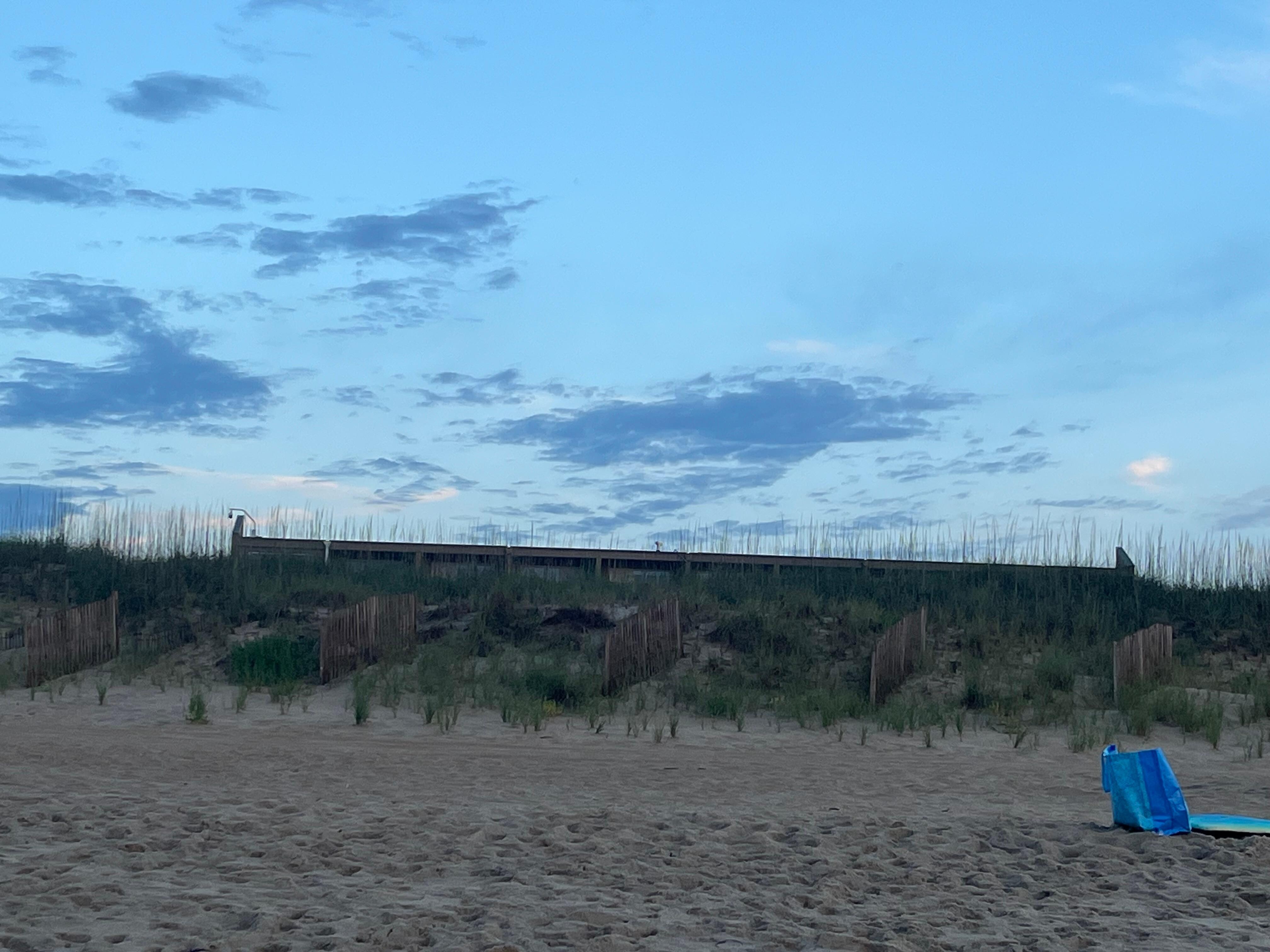 View of hotel tower rooms from beach/ocean shore line