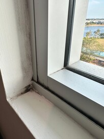 Window sill behind the curtains