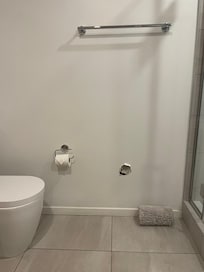 Hole in bathroom wall and door that would not close for privacy