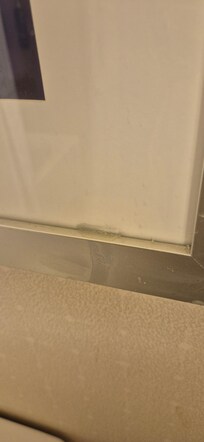 Dirty spilled on the picture and wall