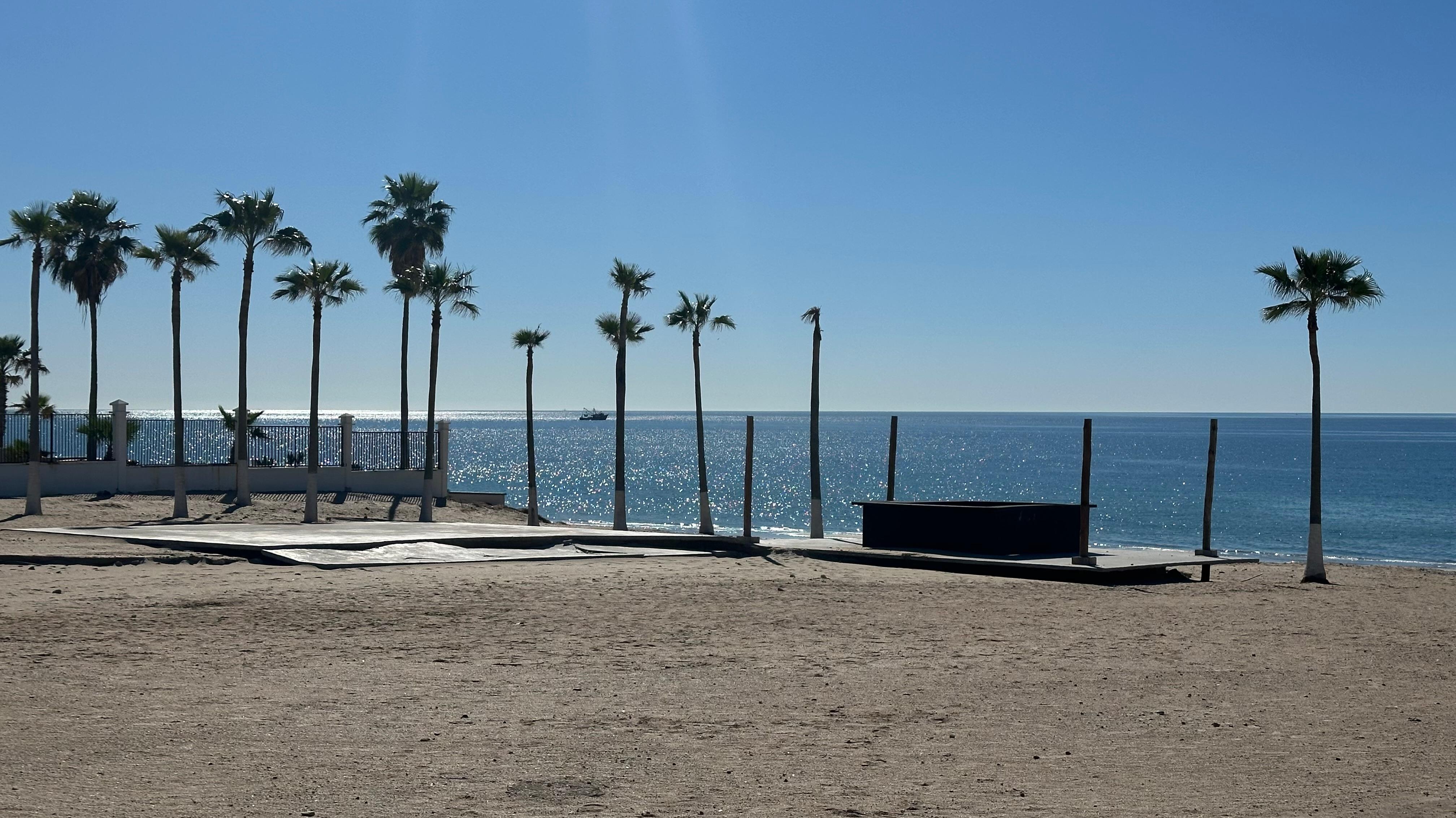 A shrimp boat just off shore 