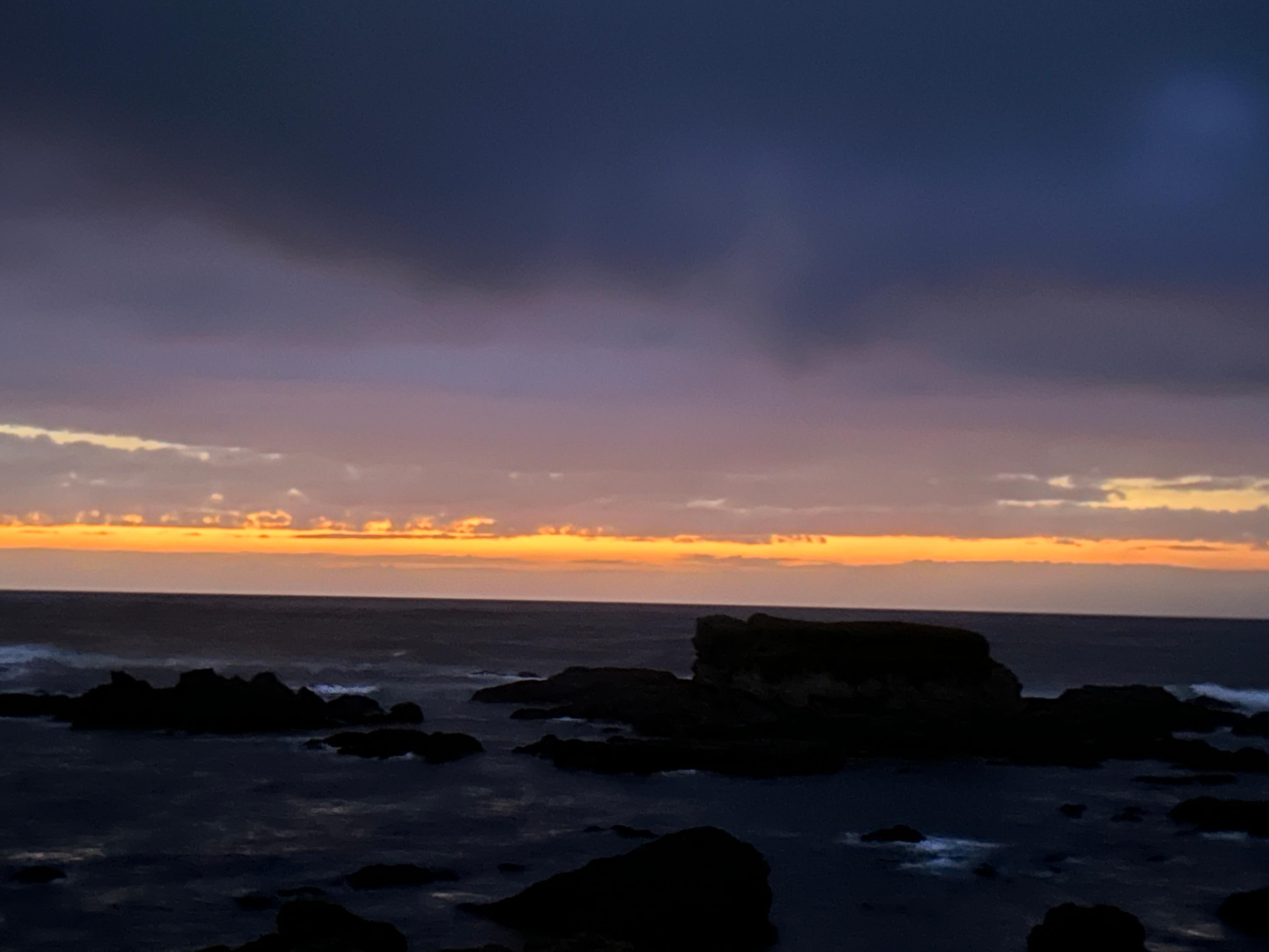 The sun setting on the ocean (5 minute walk from the hotel