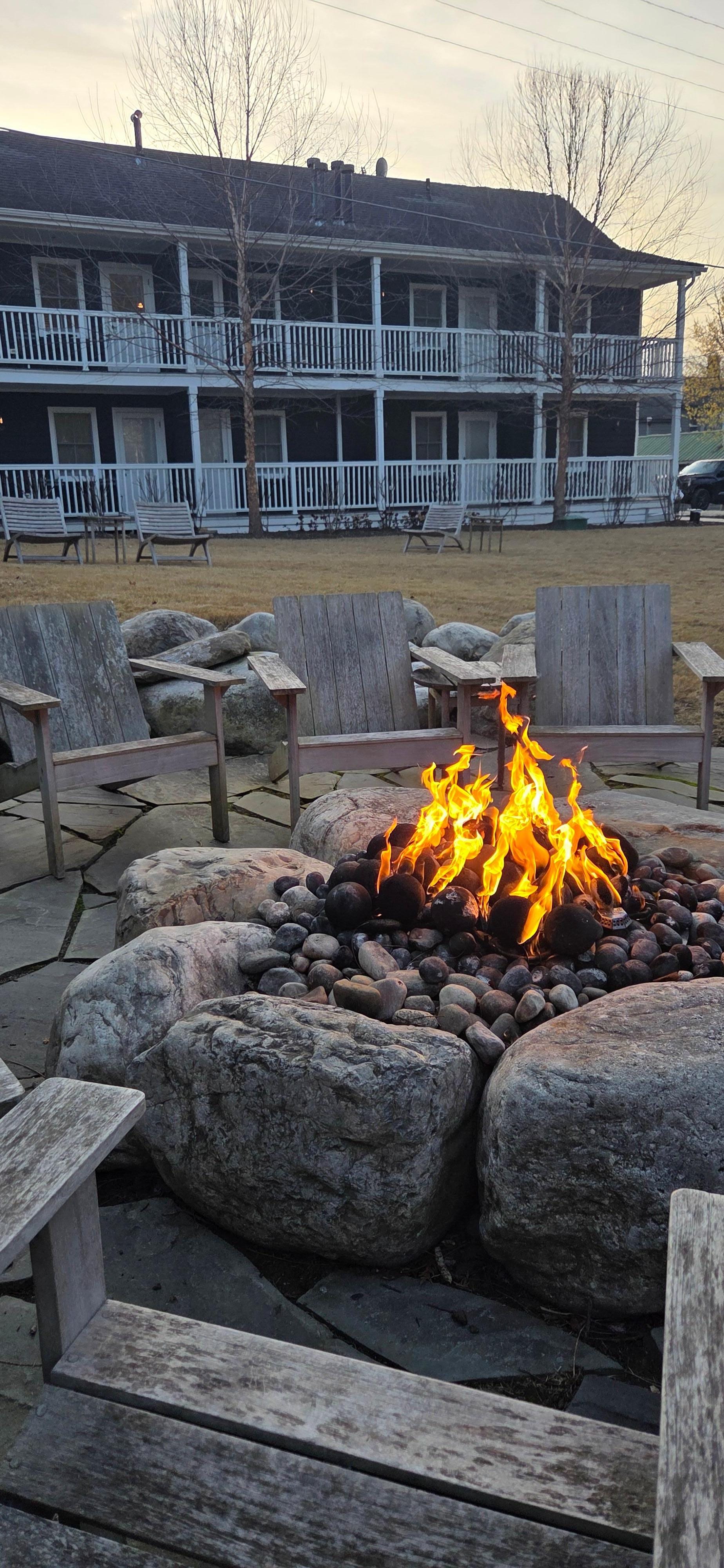 Backyard fireplace with a s'more package.