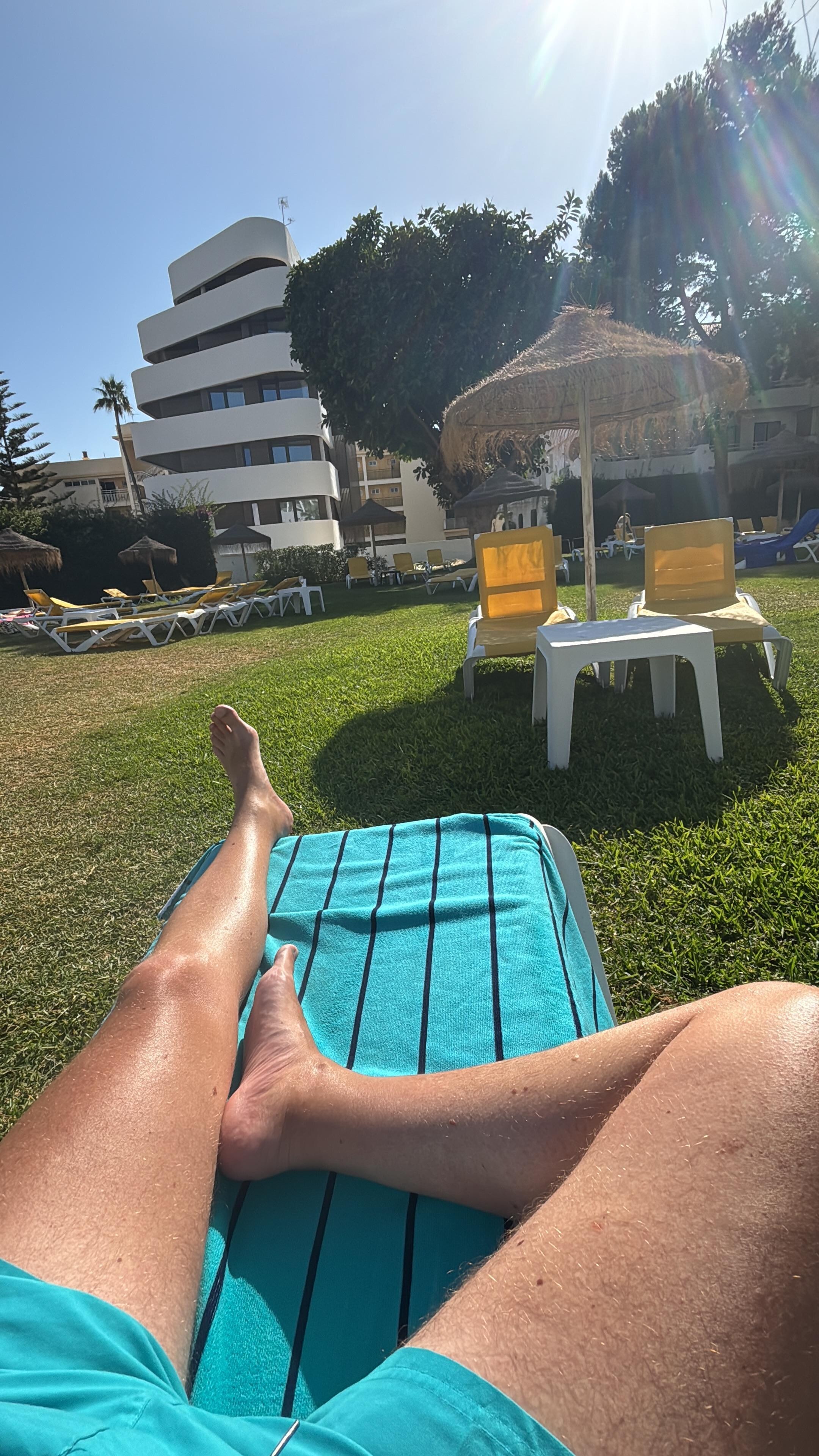 Clean and comfortable loungers with plenty of space and fixed umbrellas 