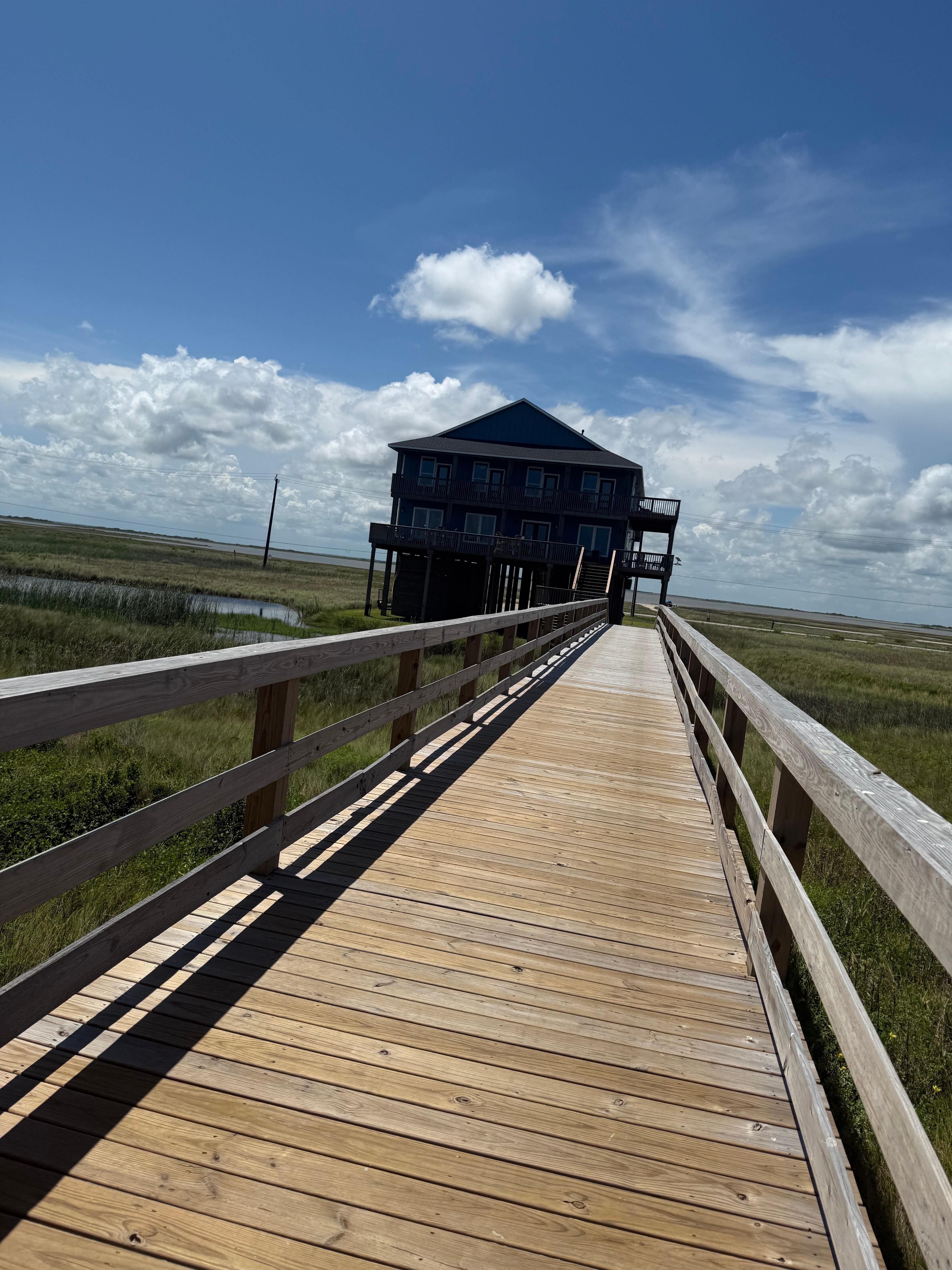 View of the house walking back from the beach. 