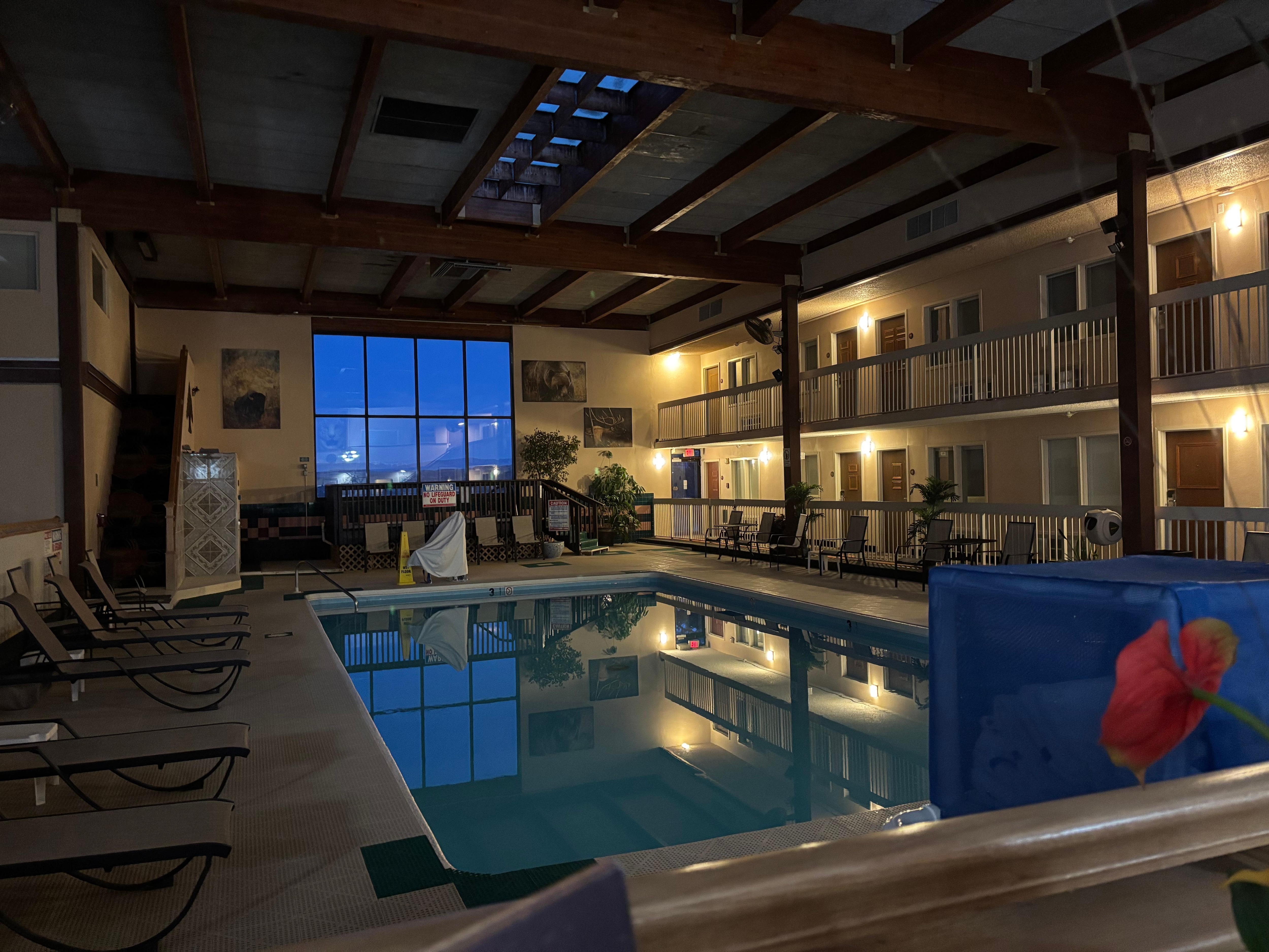 the atrium area with the swimming pool