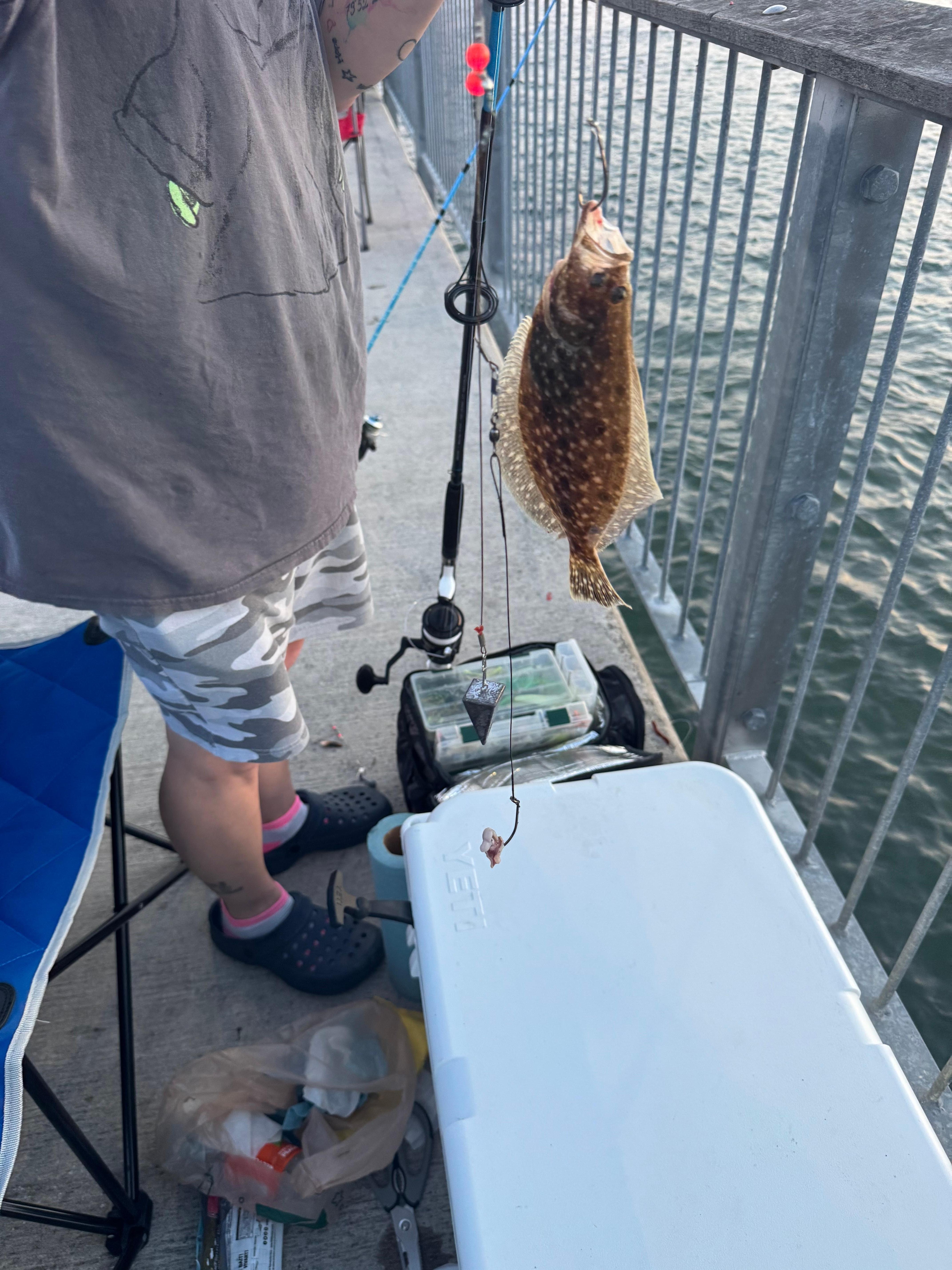 Fishing at pier by the hotel 