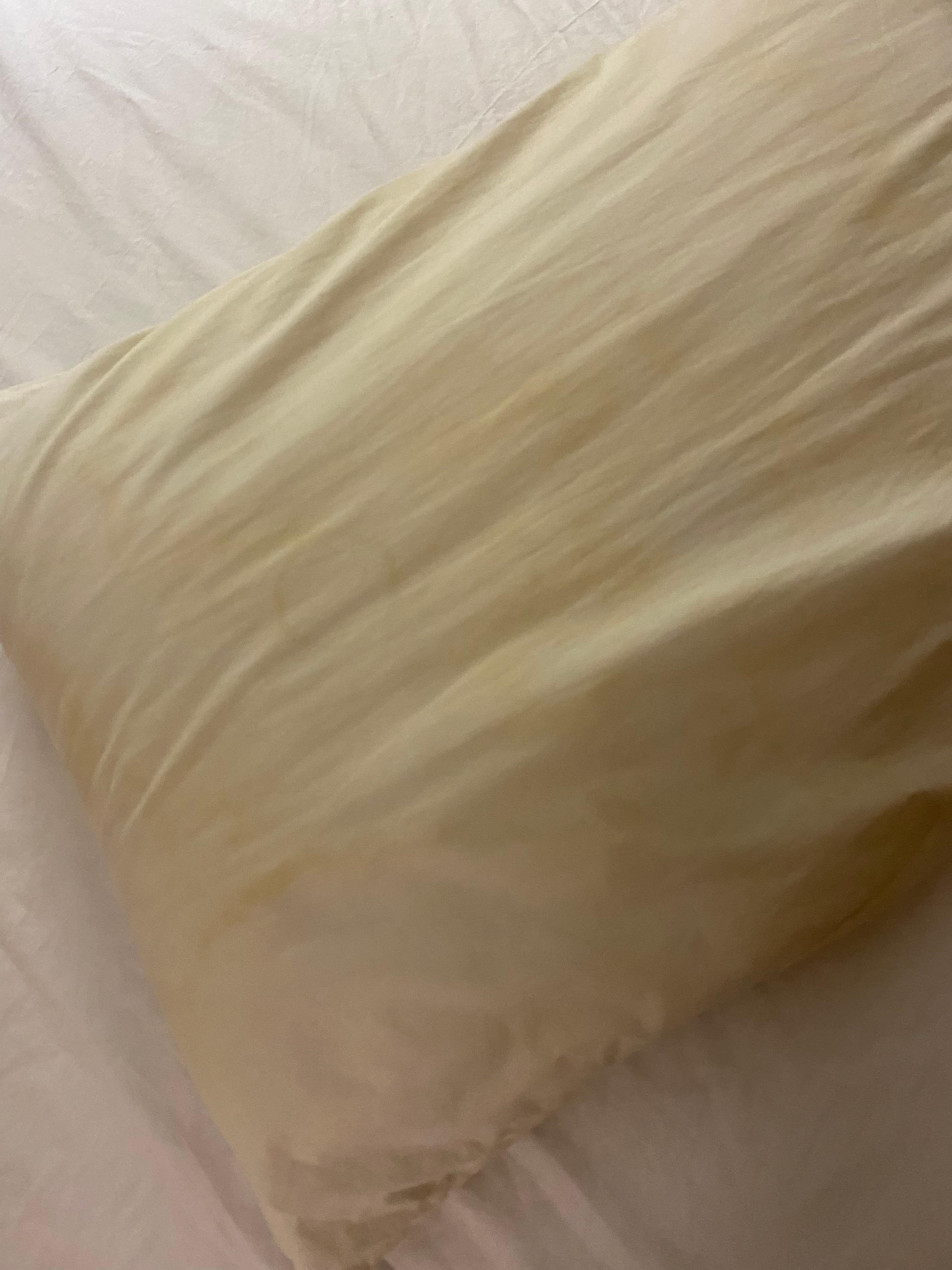 Yellow pillows bed not made look like someone just checked out and they checked us in without even cleaning the room 