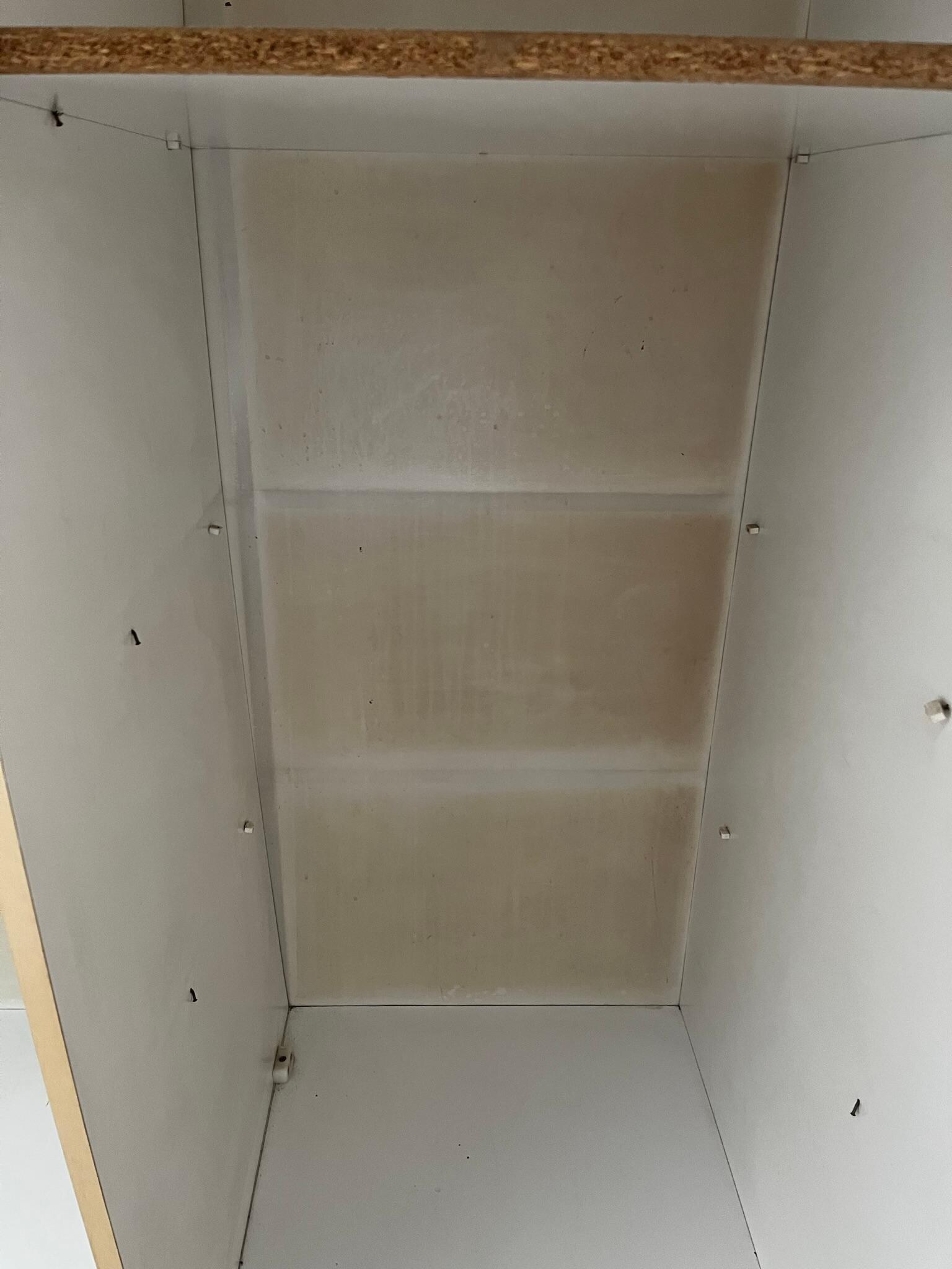 Cupboard inside wardrobe.