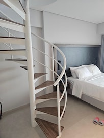Spiral staircase looks good but not practical with young kids.