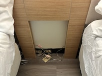 this was beind the bedside stand. we had to pull it out looking for an outlet