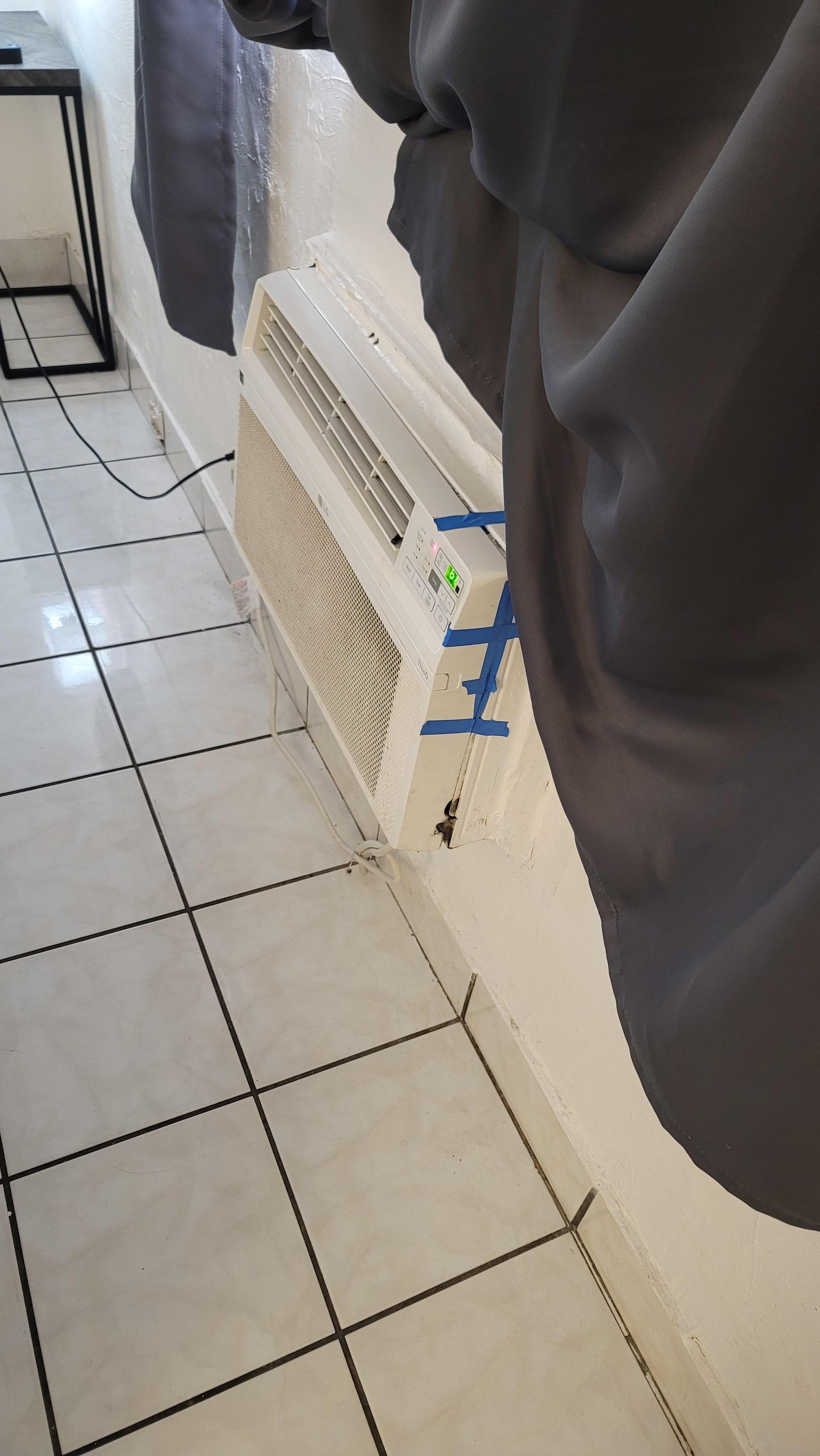 Air Conditioner w/tape.