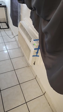 Air Conditioner w/tape.