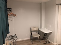 Portable desk and chair. No iron or board and no dryer or coffee